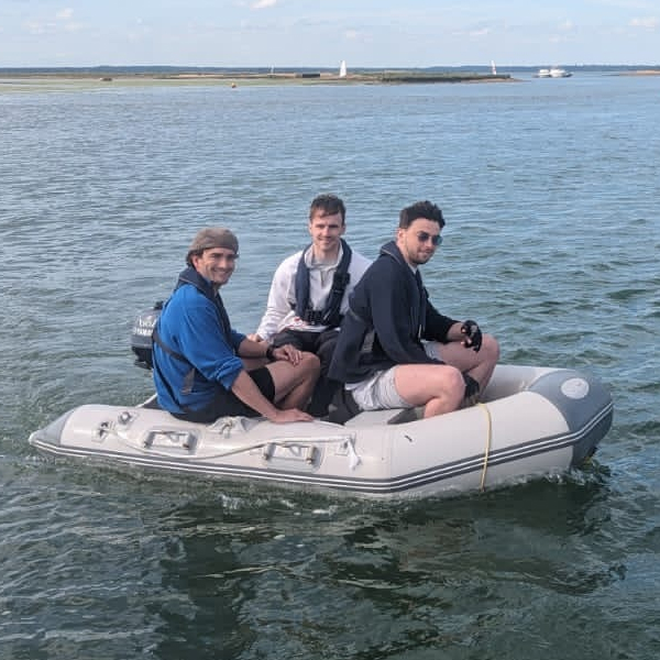 Motorboat cruising creating wake